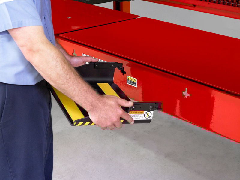 technician putting on workstep four post lift