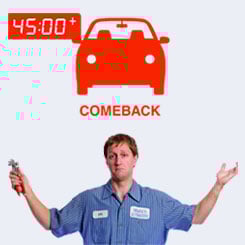 technician with arms up under red car graphic